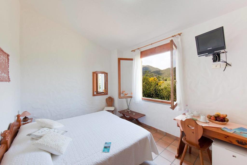 Hotel S'Obreschida Castiadas Pokoj fotografie