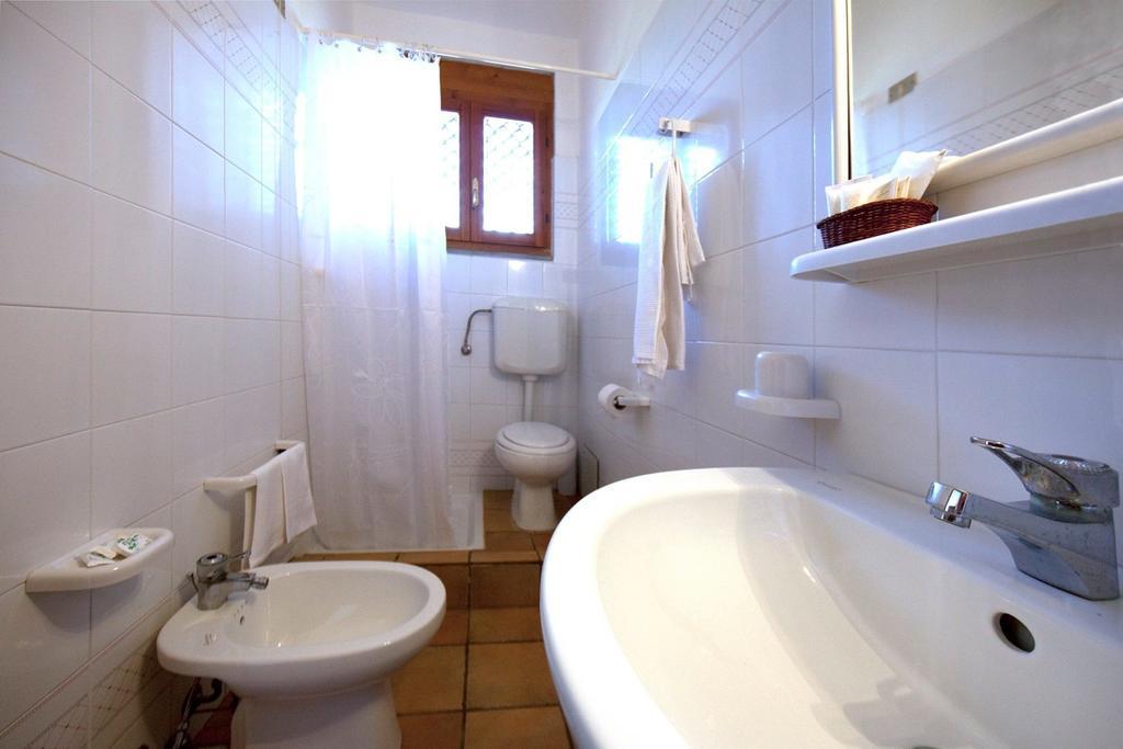 Hotel S'Obreschida Castiadas Pokoj fotografie