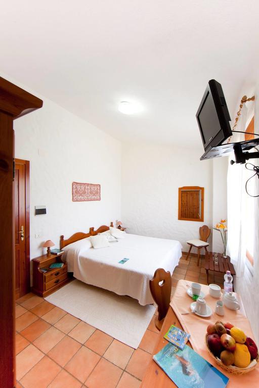 Hotel S'Obreschida Castiadas Pokoj fotografie